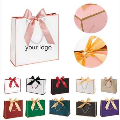 Paper Gift Bag with Ribbon Bow and Cord Handles